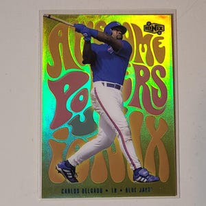 Carlos Delgado 2000 UD Ionix Awesome Powers Insert Baseball Card