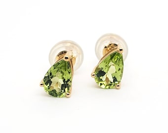 14K Gold pear shaped peridot stud earrings 6.5mm x 4.5mm