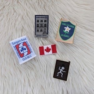 meisjesgids Canada Quebec raadslint, patches en badges, Canadese vlag, lachende kabouters die huizen helpen, Montreal gidshuis, Sangam gebied