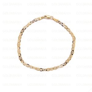 May include: A gold-colored chain bracelet with a mariner link design. The bracelet is made of a shiny, yellow metal and features a lobster clasp closure. The links are oval-shaped and interlock to form the chain.