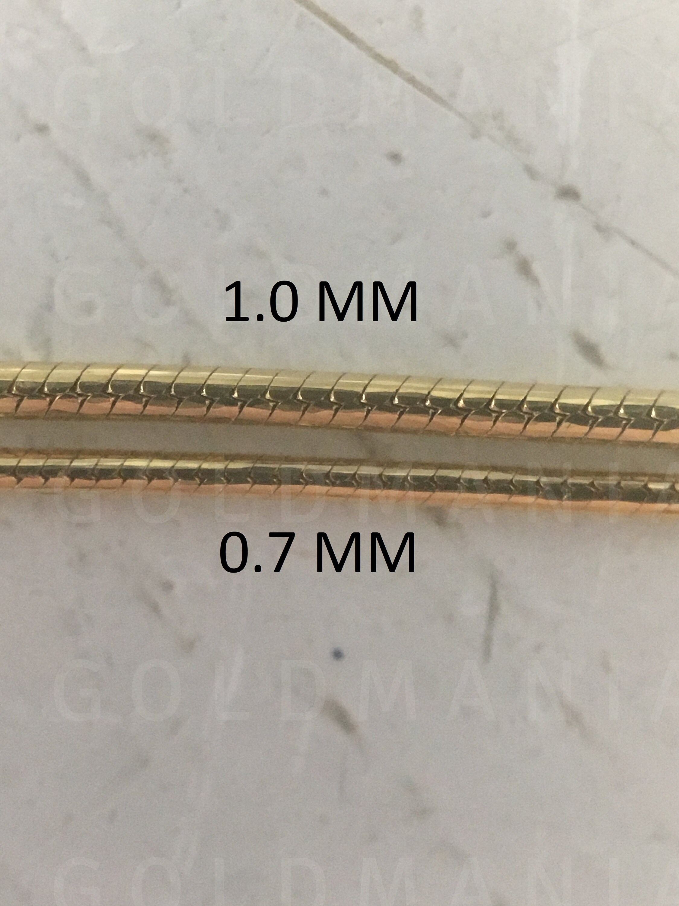 16 Inches 14K Real Yellow Gold 0.7mm Round Snake Chain Necklace 16 Inches 14K Real Yellow Gold 0.7mm Round Snake Chain Necklace