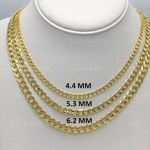 May include: Three gold-colored curb chain necklaces displayed on a white bust. The chains are 4.4 mm, 5.3 mm, and 6.2 mm in width. The word "GOLDMANIA" is visible in the background.