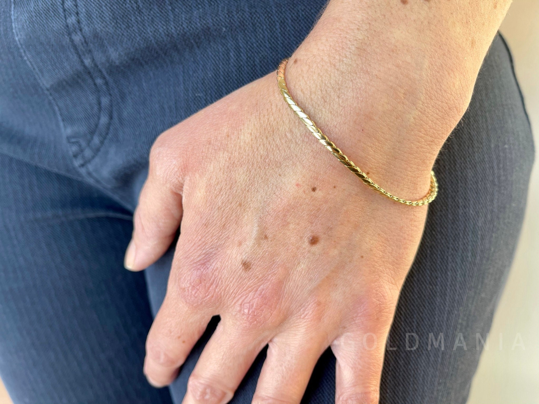 Gold serpentine best sale bracelet