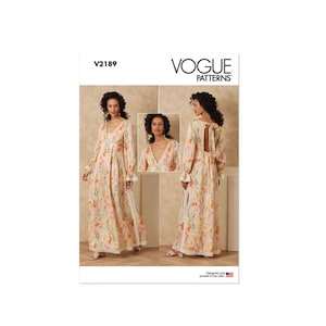 May include: Vogue Patterns V2189 sewing pattern envelope featuring a floor-length dress with a floral print in shades of orange, pink, and green. The dress has long sleeves with ruffled cuffs, a deep V-neckline, and a tie closure at the back.