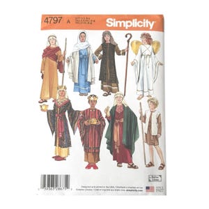 May include: A Simplicity sewing pattern envelope 4797 featuring illustrations of various historical and nativity-themed costumes. The cover displays eight figures in robes, tunics, and headpieces, including an angel with gold wings and a king with a crown.