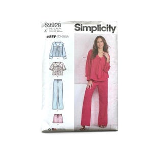 May include: Simplicity sewing pattern S9928 for an easy-to-sew top and pants set. The envelope displays technical line drawings of four garment variations and a photograph of a long-sleeved red blouse with a tie-neck and matching trousers.