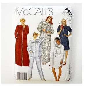 May include: A vintage McCall's sewing pattern packet featuring illustrations of sleepwear designs. The packet includes images of a long red robe, a floral print nightgown, a blue dress, and a white nightshirt and pajama set. The pattern number is P922.