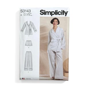 May include: Simplicity sewing pattern S3143 for a wrap-style top with long sleeves and a tie waist, paired with either shorts or wide-leg trousers. The garment features a white fabric with thin vertical dark stripes. Sizes range from XS to XXL.