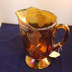 Amber Carnival Glass Pitcher and juice glasses