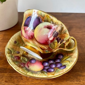 Aynsley Gold Orchard Teacup And Saucer N. Burnt