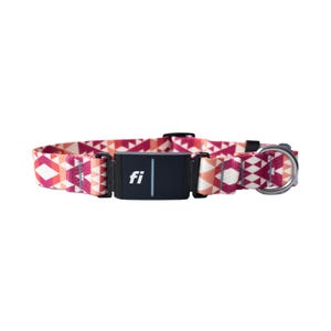 May include: A patterned dog collar with a black rectangular device in the center. The collar features a geometric design in shades of pink, orange, and white. The black device has the letters "fi" and a vertical line.