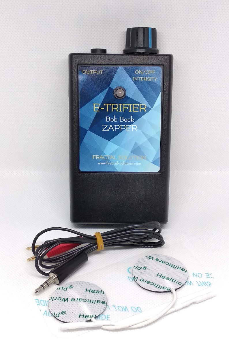 May include: Black electronic device labeled "E-TRIFIER Bob Beck ZAPPER" with a dial and output port. Includes a cable with red and black connectors, and two round electrode pads. The device has the text "Fractal Solution" and a website address.