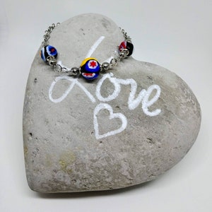 Stainless steel bracelet with Murano millefiori bead