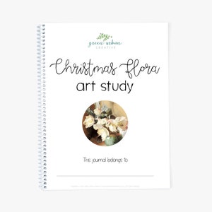 May include: A white spiral bound journal with the title "Christmas Flora Art Study" and a painting of white flowers in a vase. The text "This journal belongs to" is at the bottom of the page.