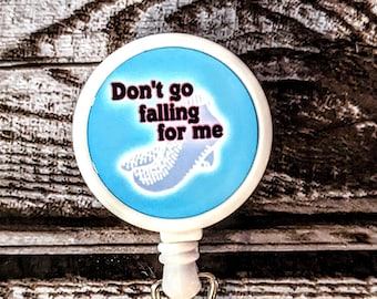 Don't go falling for me slipper socks badge reel