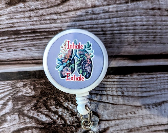 Inhale exhale floral lung badge reel