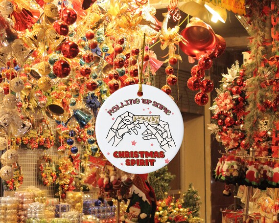 Rolling up some christmas spirit ceramic ornament