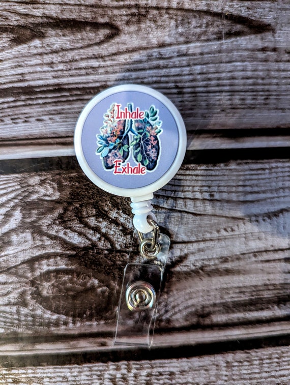 Inhale exhale floral lung badge reel