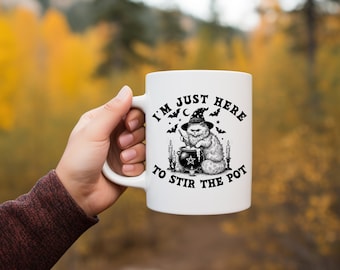 Just here to stir the pot coffee cup
