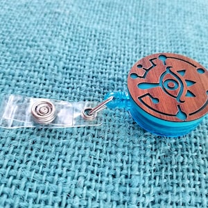 Porta credencial retráctil con clip Sheikah Slate
