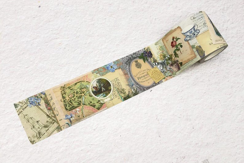 May include: Decorative washi tape featuring a vintage collage design. The tape showcases botanical illustrations, postage stamps, and ornate frames in a palette of beige, green, blue, and pink. A roll of tape is visible.