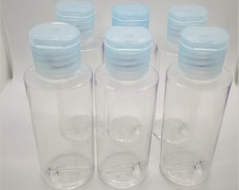 Zylinder Runde Mehrwegflaschen mit Flip Top Caps - 2 oz (klar). Packung mit 6 Flaschen und Verschluss.