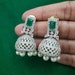 Traditional American Diamond Jumka with semi precious Ruby/ Emerald, Silver covering as base coat for diamonds and gold covering all over. 