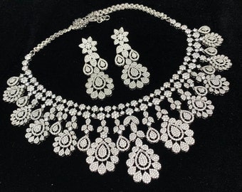 Silver covering American Diamond Necklace,  High quality stones, Set includes earrings.