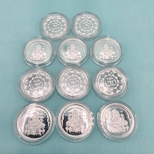 Ganesh Ji 5 gm coins, Capsule pattern Ganesh and OM on 2 sides.