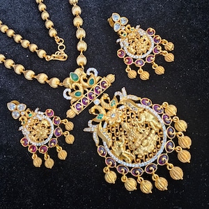Lakshmi devi big  Pendant with chain and earrings, Semi precious Ruby and emeralds.