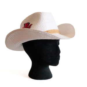 Vintage White Straw Cowboy Hat with Woven Band and Red Feather Accent