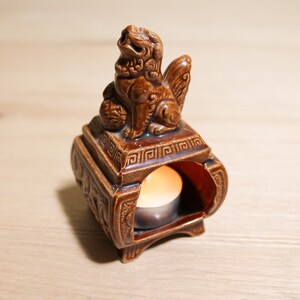 Année du détenteur asiatique de bougie de céramique de dragon ou zodiaque chinois de brûleur d’encens