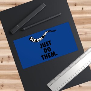 May include: Blue rectangular sticker with white text that reads "Six One Three Commands" in a curved line and "Just Do Them." in a straight line.