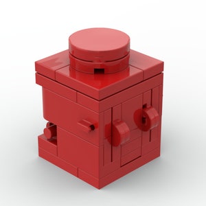 Könnte beinhalten: Ein rotes Lego-Gebäude aus Steinen mit einem runden Dach und zwei kleinen Rädern an der Seite.