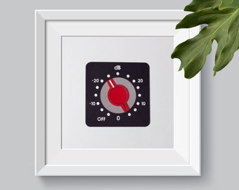 May include: A black and silver knob with a red pointer, labeled "dB" and with markings from -20 to 20, and "OFF" at the bottom.