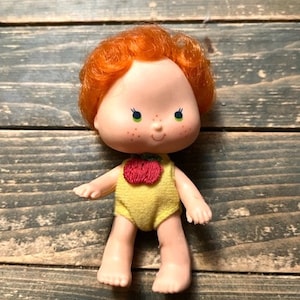 Vintage 70s Apple Dumplin Baby Strawberry Shortcake Friend Toy American Greetings Toy Wearing Yellow Onesie with Apple
