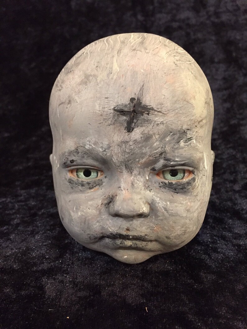scary doll head