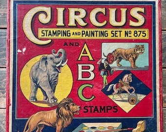 Juego de sellos vintage de circo y ABC de los años 30, de madera y caucho, con imágenes y letras de circo en una caja roja, con excelentes gráficos, Baumgarten Rustic.