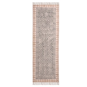 May include: A rectangular runner rug with a geometric pattern. The rug features a central black and white lattice design, framed by a gray border and a decorative brown border. The rug has fringe on both ends.