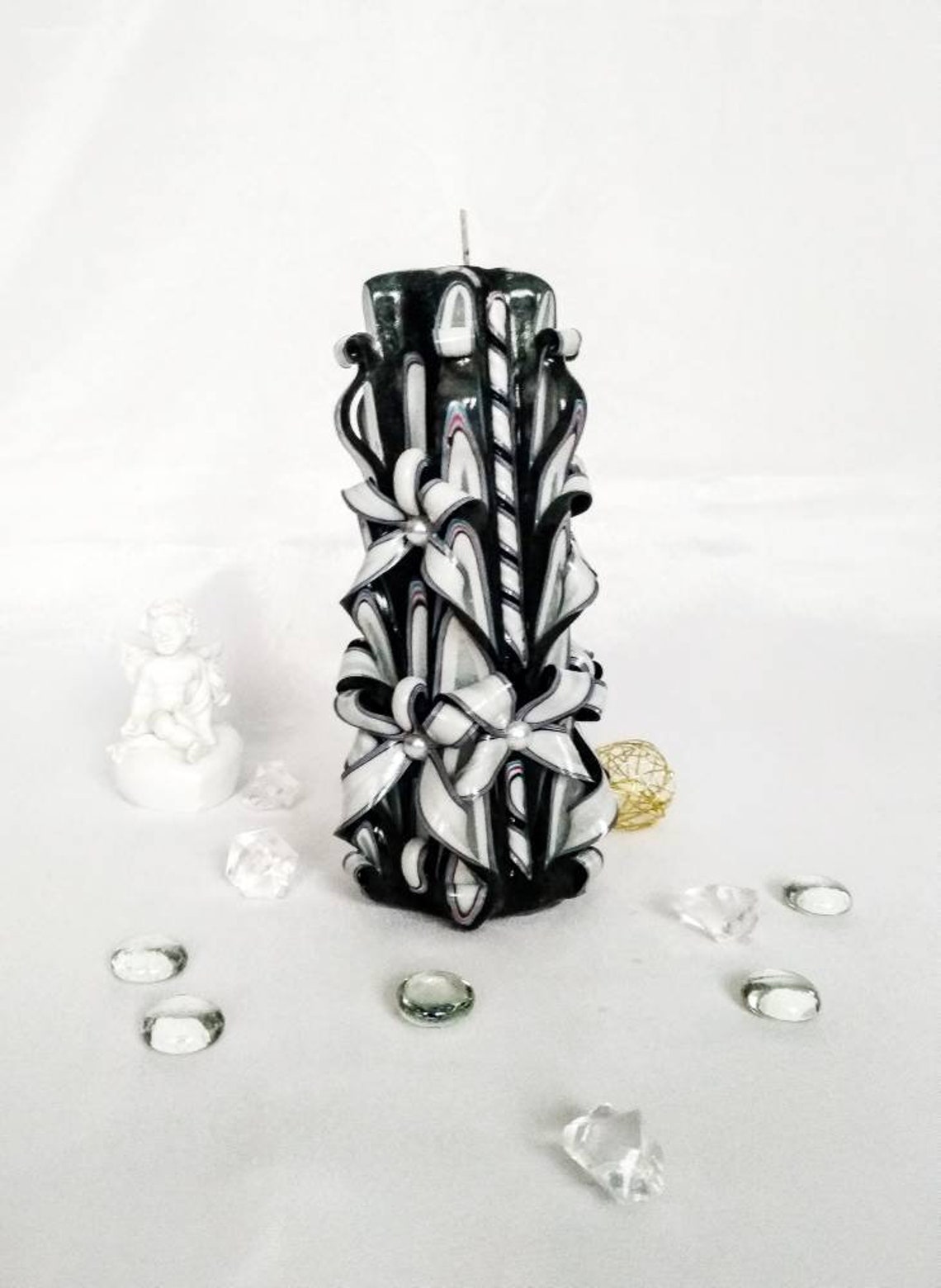 Grey carved candle may be the perfect decor for your home. Etsy