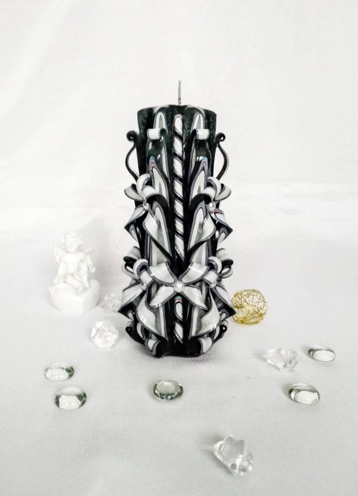 Grey carved candle may be the perfect decor for your home. Etsy