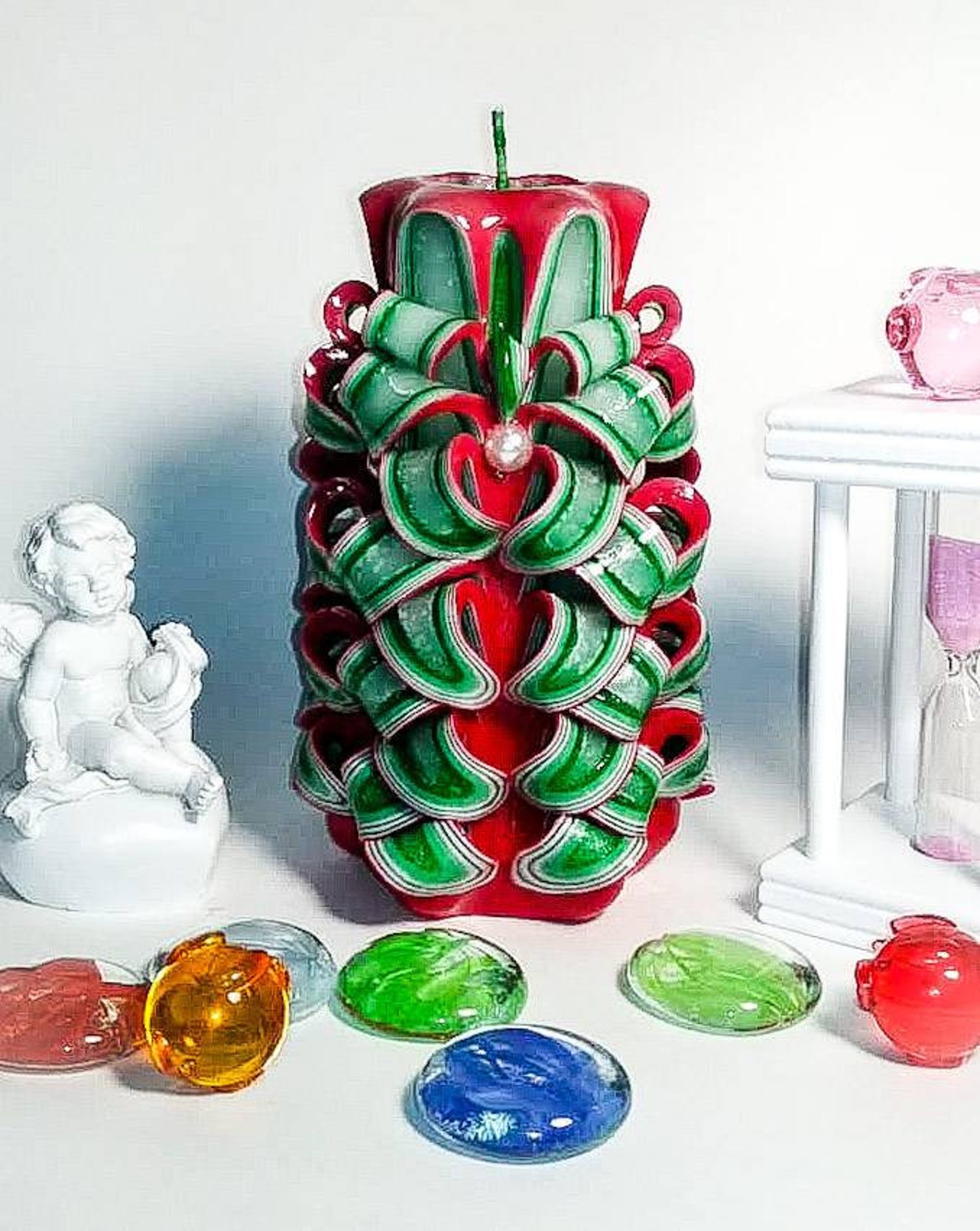Beautiful red and green carved candle looks like the small Etsy