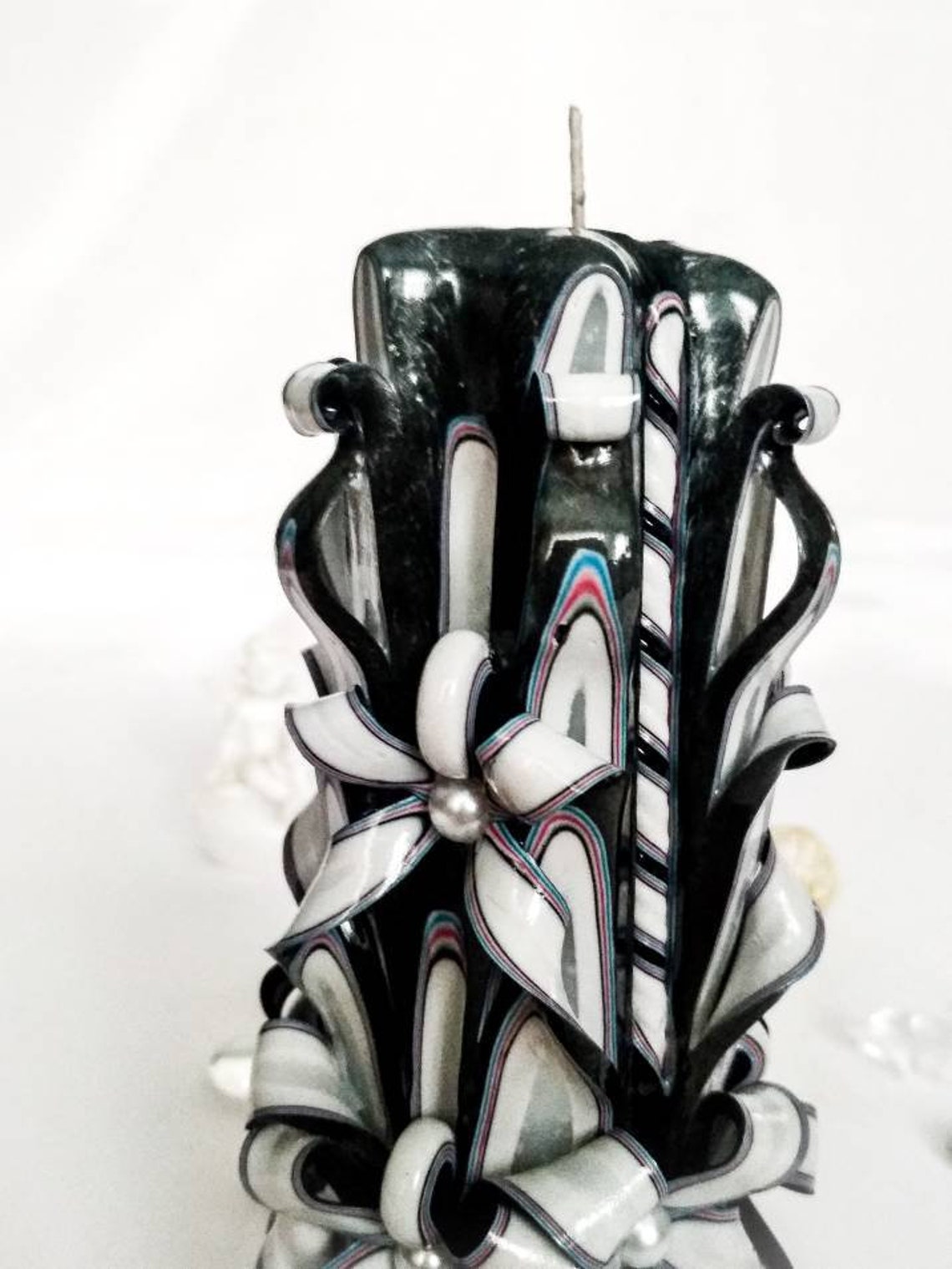 Grey carved candle may be the perfect decor for your home. Etsy