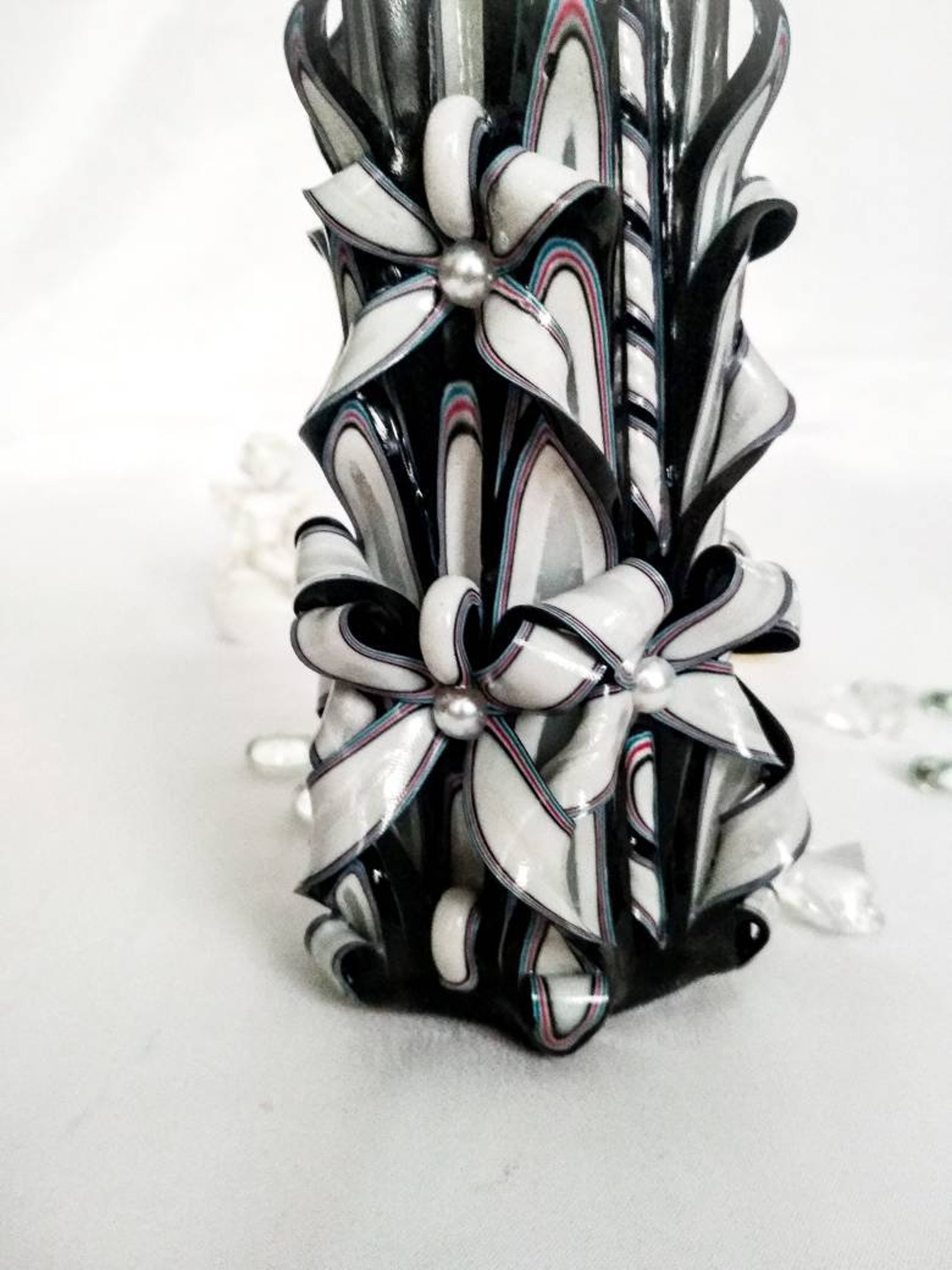 Grey carved candle may be the perfect decor for your home. Etsy