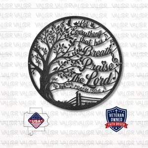 May include: A black metal wall art piece featuring a tree design with the words "Let Everything That Has Breath Praise The Lord" and Psalm 150:6. The artwork includes musical notes, birds, and a fence.