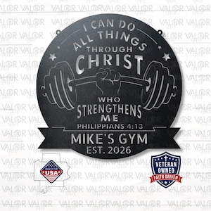 May include: Black metal wall art with the text "I CAN DO ALL THINGS THROUGH CHRIST" and "MIKE'S GYM EST. 2026". Features a barbell and the phrase "Who Strengthens Me". Includes a "Made in the USA" emblem.