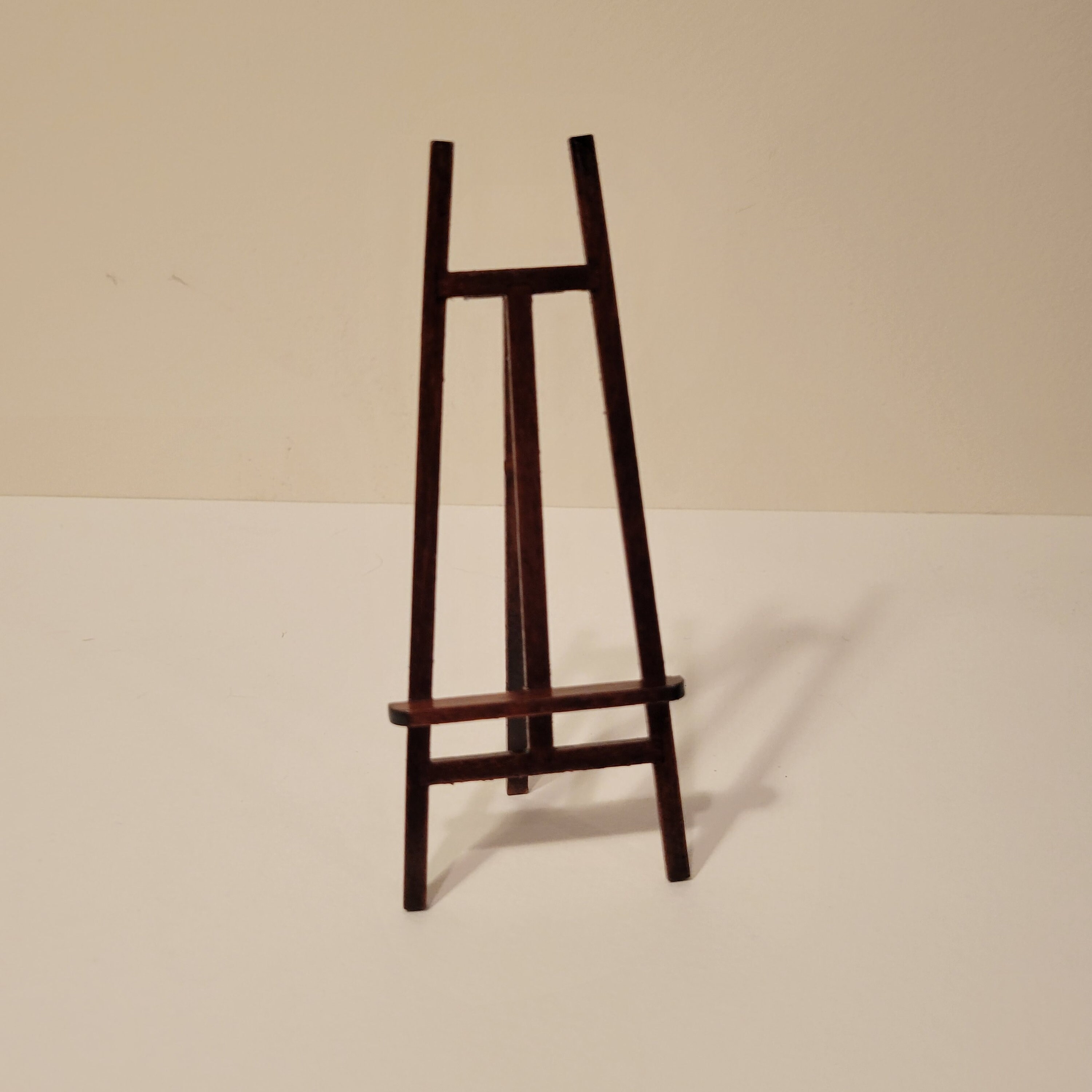 Wooden Display Easel with Height-Adjustable Pegs, 60 inches Tall - Black