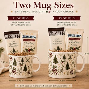 Heritage Christmas mug gift set shown in 11 oz and 15 oz sizes with evergreen, holly, burgundy bow and gold star artwork, paired with full-size Hershey’s chocolate and Swiss Miss cocoa.