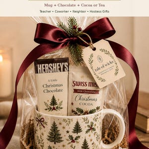 Heritage Christmas mug gift wrapped in clear cello with burgundy ribbon, Hershey’s chocolate and cocoa or tea, styled as a ready-to-give Christmas gift for teachers, coworkers, neighbors and hostesses.