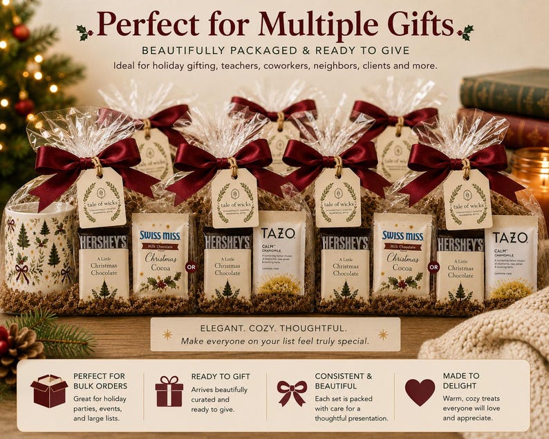 Heritage Christmas mug gift sets wrapped in clear cello with burgundy satin bows, Hershey’s chocolate and a choice of Swiss Miss cocoa or Tazo tea, shown ready for coworker, teacher, neighbor and bulk holiday gifting.